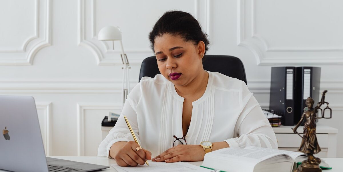 Lawyer writing on a table